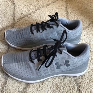 Grey Under Armour running shoes